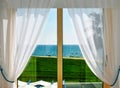 White Curtains and Window with Sea View Royalty Free Stock Photo