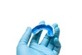 A white custom mouthguard in hand Royalty Free Stock Photo