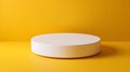 White Cylindrical Platform Centered Against Yellow Backdrop in Minimalist Studio Royalty Free Stock Photo