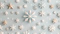 White 3D snowflakes and stars pattern on a light pastel blue winter holiday background Royalty Free Stock Photo