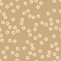White daisies scattered on a warm brown background seamless floral pattern Royalty Free Stock Photo