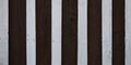 White and dark brown wooden board wall striped black background of wood plank Royalty Free Stock Photo