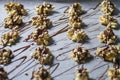 White Chocolate Energy Bites Lined Up on Cooking Parchment Paper