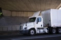 White day cab big rig semi truck for local delivery in dry van s Royalty Free Stock Photo