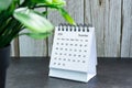 White December 2024 calendar on wooden desk. 2024 New Year Concept Royalty Free Stock Photo