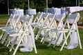 White decorated chairs on a green lawn Royalty Free Stock Photo