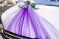 White decorated wedding car