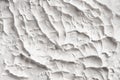 White decorative abstract plaster texture with splash and ribbed.