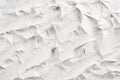 White decorative abstract plaster texture with splash and ribbed.