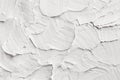 White decorative abstract plaster texture with textured smears.