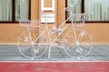 White decorative bicycle shape flower holder