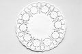 White decorative paper round napkin on a white-gray background.