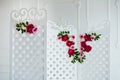 White delicate decorative wood panel in classical interior. Boudoir wedding room. Retro folding screen with flowers