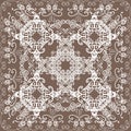White delicate oriental lace on beige background Royalty Free Stock Photo