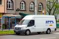 White delivery Ford Transit van of PPL company, partner of global DHL postal service, parked when delivering parcels