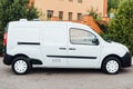 White delivery mini truck stands near building Royalty Free Stock Photo