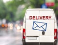 White delivery Van driving fast on city blurr bokeh street Royalty Free Stock Photo