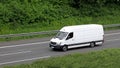 White Delivery Van Driving On Highway Royalty Free Stock Photo