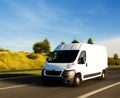 White delivery van on highway Royalty Free Stock Photo