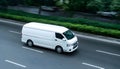 White delivery van on highway road. Royalty Free Stock Photo