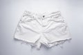 White denim shorts  front pockets  flat lay Royalty Free Stock Photo