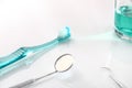 White dentist table with tools and teeth cleaning concept elevated