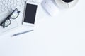 White desk office with laptop, smartphone and other work supplies with cup of coffee. Top view with copy space for input the text Royalty Free Stock Photo