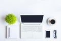 White desk office with laptop, smartphone and other work supplies with cup of coffee. Top view with copy space for input the text Royalty Free Stock Photo