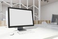 White desktop screen on an office table side Royalty Free Stock Photo