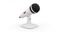 A white desktop microphone with a black mesh top is mounted on a matching Royalty Free Stock Photo
