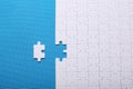 White details of a puzzle on a blue background. A puzzle is a pu Royalty Free Stock Photo