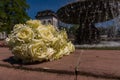 White Diamond Rose Bouqet Flowers at Fountain Outdoors Wedding