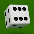 White dice with black dots hanging in half turn showing number 6 isolated on green background
