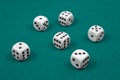 White dice on green felt Royalty Free Stock Photo