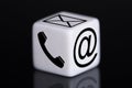 White dice with mail and phone icons Royalty Free Stock Photo