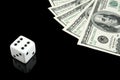 White dice and money on black background Royalty Free Stock Photo