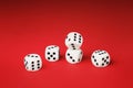 White dice on red background. Board game concept. Royalty Free Stock Photo