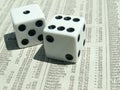 White dice on stock report Royalty Free Stock Photo