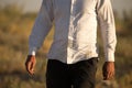 White dirty shirt on a man in the nature Royalty Free Stock Photo