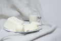 White dishes at white fabric as a background Royalty Free Stock Photo