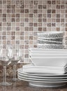 White dishes and plates on kitchen countertop Royalty Free Stock Photo