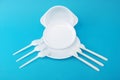 White disposable dishes, fork and spoon Royalty Free Stock Photo