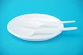 White disposable dishes, fork and spoon Royalty Free Stock Photo