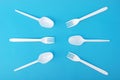 White disposable dishes, fork and spoon Royalty Free Stock Photo