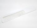 White disposable plastic hair comb Royalty Free Stock Photo