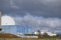 Moody dark clouds above Sizewell B reactor building in Sizewell, Suffolk.