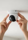 White dome camera installation security camera ceiling mount Royalty Free Stock Photo