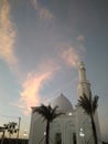 White dome mosque with sunset Royalty Free Stock Photo