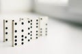 White domino, domino principle, on white background Royalty Free Stock Photo