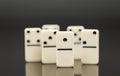 White dominoes showing leader or winner Royalty Free Stock Photo